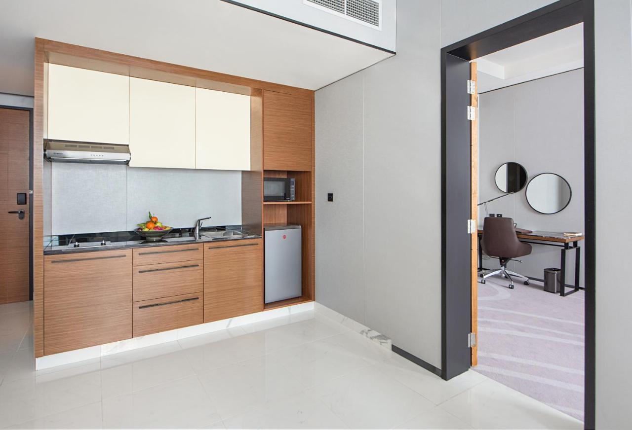 Asiana Grand Hotel Dubai Ngoại thất bức ảnh A kitchenette in a hotel